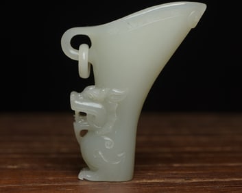 A piece of Hetian jade dragon cup