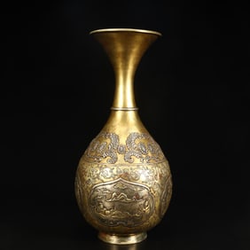 A Qing Dynasty copper gilt consecrated figure pattern jade pot spring vase