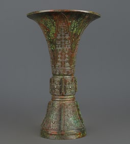 A Western Zhou bronze full work round statue
