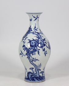 A blue and white bat longevity peach pattern olive bottle made in the Qianlong period of the Qing