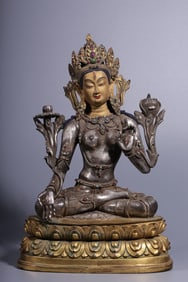 A seated statue of White Tara in the Qing Dynasty with copper, gilt and silver