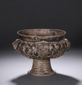 A Tang Dynasty silver beast face lotus petal pattern high-foot furnace