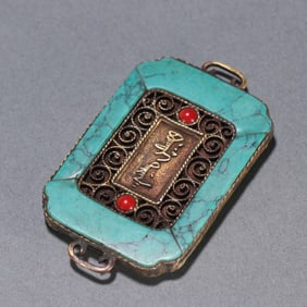 A Qing Dynasty silver-gilt turquoise fasting plaque