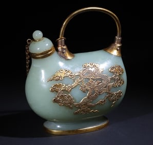 A Qing Dynasty silver-gilt inlaid blue and white jade dragon and phoenix Chengxiang pot