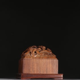 A Qing Dynasty Huanghuali carved dragon twisted seal