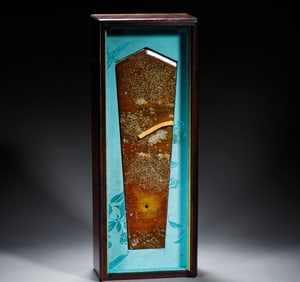 A piece of Huanghuali boxed jade