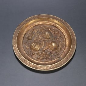 A Tang Dynasty silver-gilt longevity peach appreciation plate