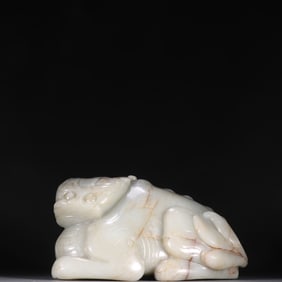 A Qing Dynasty Hetian jade unicorn book ornament