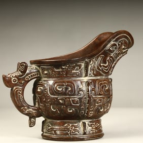 A piece of Qing Dynasty agarwood imitation bronze cup centimeters centimeters centimeters