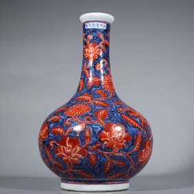 A Ming Xuande blue and white alum red flower vase