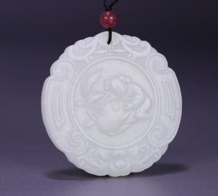 A Hetian jade "pomegranate hundred sons" card