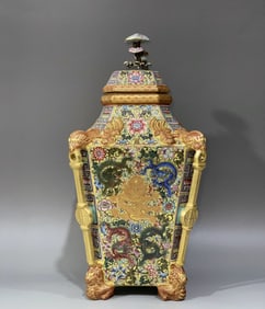 A Qianlong year yellow ground flower head pattern dragon and phoenix gold-painted carved square