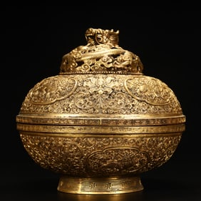 A Qing Dynasty copper gilt hollow dragon pattern auspicious beast entwined lotus pattern