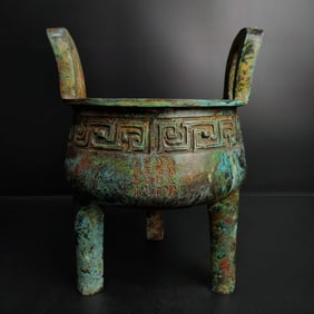 A bronze three-legged tripod of the Shang and Zhou dynasties
