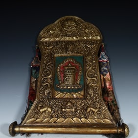 A Qing Dynasty copper-gilt thangka