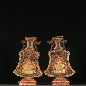A pair of silver-gilt cloisonnés inlaid with treasure vases