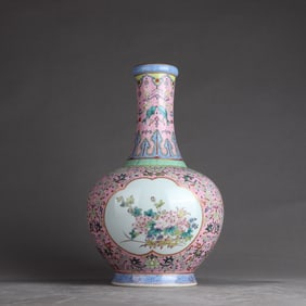 A Qing Dynasty Qianlong pink pastel entwined lotus window flower vase