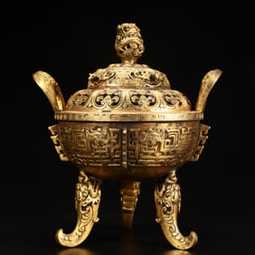 A Qing Dynasty copper-gilt hollow dragon pattern amphora three-legged aromatherapy stove