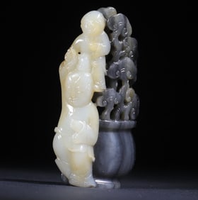 A Qing Dynasty blue and white seed material cleverly carved "Lingtong Xianrui" pendant