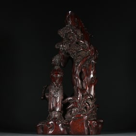 A Qing Dynasty agarwood maid Shanzi ornament