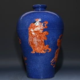 A Ming Xuande snowflake blue glaze alum red four heavenly kings pattern plum bottle