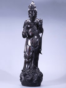 A Qing Dynasty rosewood Guanyin Buddha statue ornament