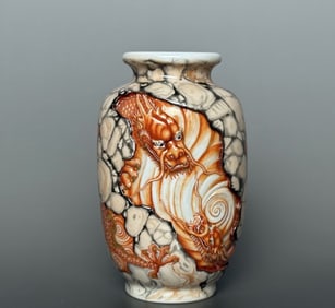 A Qianlong stone pattern glaze Canglong godson gold-painted carved winter melon bottle