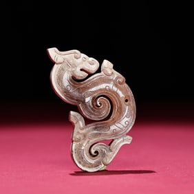 A Han Dynasty jade dragon pendant