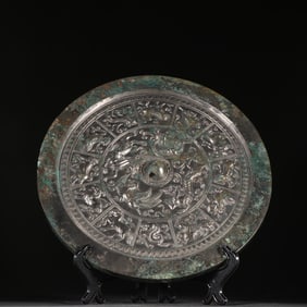 A bronze mirror of the Han Zodiac
