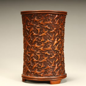 A Qing Dynasty boxwood carving hundred crane pattern pen holder