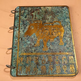 A bronze gold book