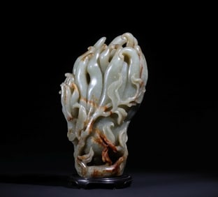 A Qing Dynasty Qin-colored jade Buddha hand furnisher