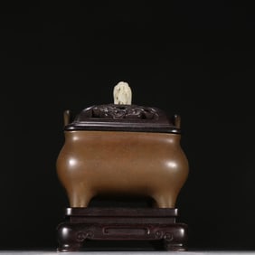 A Ming Xuande four-legged aromatherapy burner