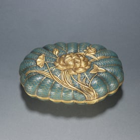 A Qing Dynasty copper-gilt cloisonné lotus leaf lid box