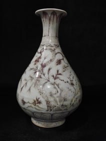 A Yuan Dynasty glazed red pine bamboo plum jade pot spring