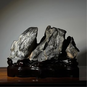 A Qing Dynasty Lingbi stone study ornament