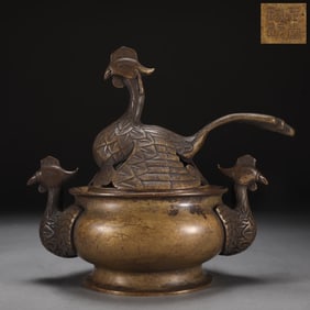 A Ming Dynasty profound copper tire phoenix smoker
