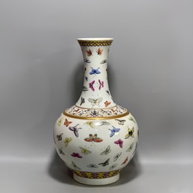 A pastel hundred butterfly appreciation vase made in the Guangxu Year of the Qing Dynasty