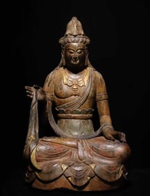A Tang Dynasty bluestone painted Guanyin statue