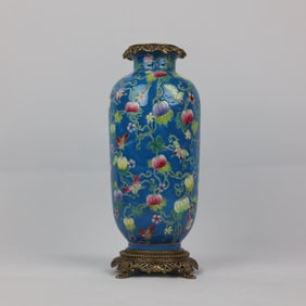 A blue ground pumpkin pattern inlaid copper-rimmed winter melon bottle