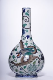 A Qing Dynasty Yongzheng year made Doucai Kuilong patterned long neck bottle