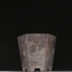 A Qing Dynasty purple sand and a beautiful flower pot