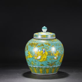 A Ming Dynasty Wanli green yellow figure lid jar
