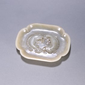A Qing Dynasty Hetian jade Pisces plate