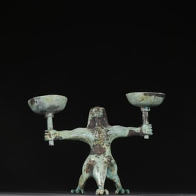 A Han Dynasty bronze humanoid oil lamp
