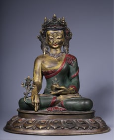 A seated statue of the Medicine Buddha in the Qing Dynasty copper lacquer