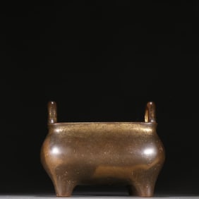 A Ming Dynasty Xuande copper tire gold-painted incense burner