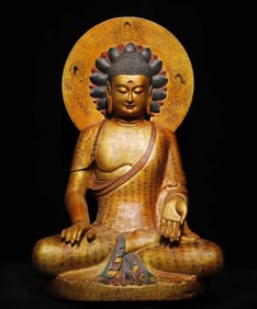 A Tang bluestone gilt painted Buddha statue