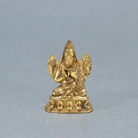 A copper-gilt Tsongkhapa inch Buddha of the Qing Dynasty