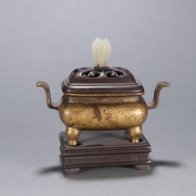 A Ming Dynasty Xuande morning crown ear aromatherapy stove